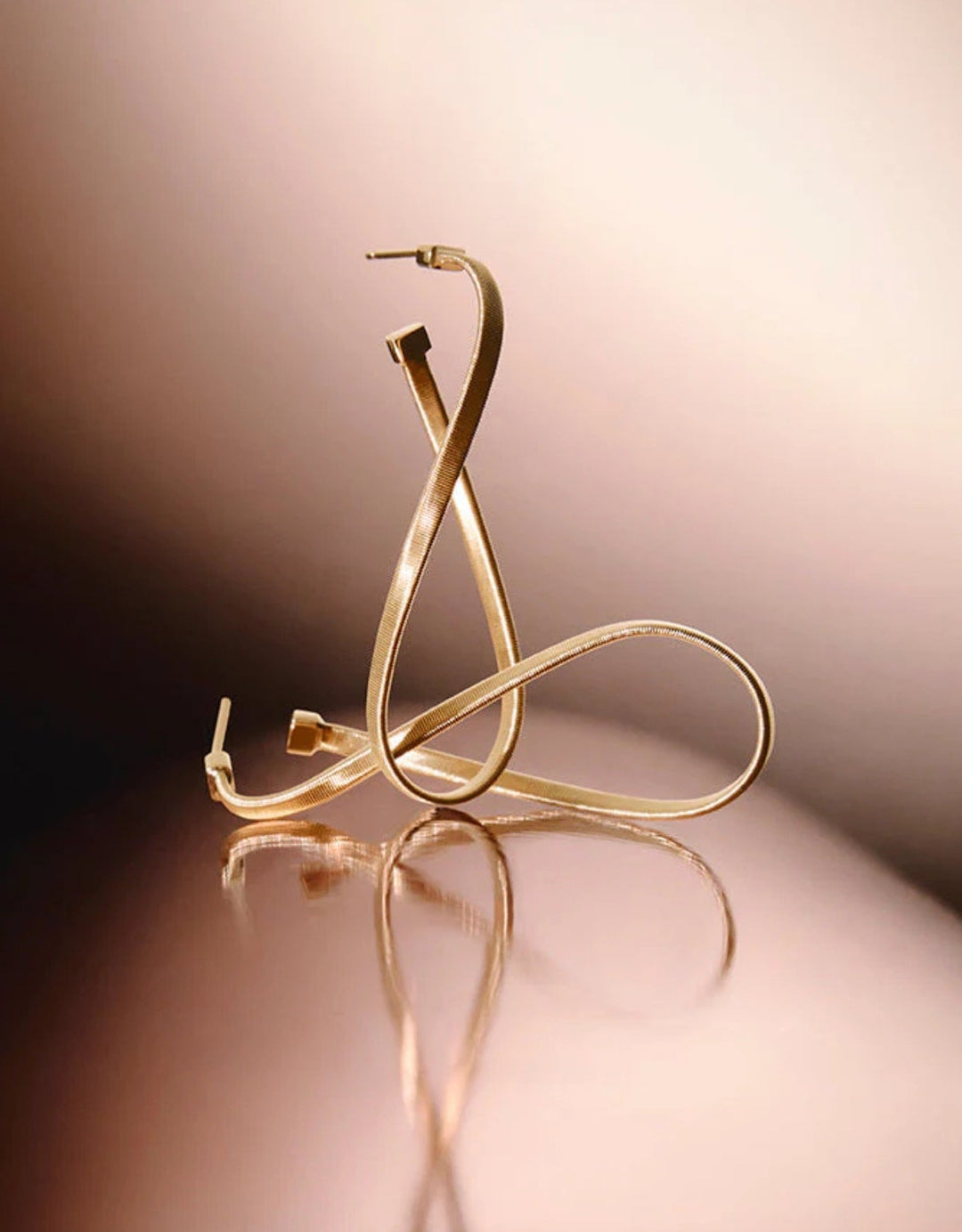 marco-bicego-marrakech-twisted-irregular-medium-hoops-18k-yellow-gold-OG405__Y_01