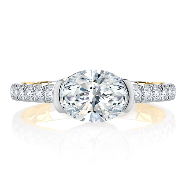Two Tone East West Half Bezel Oval Cut Engagement Ring